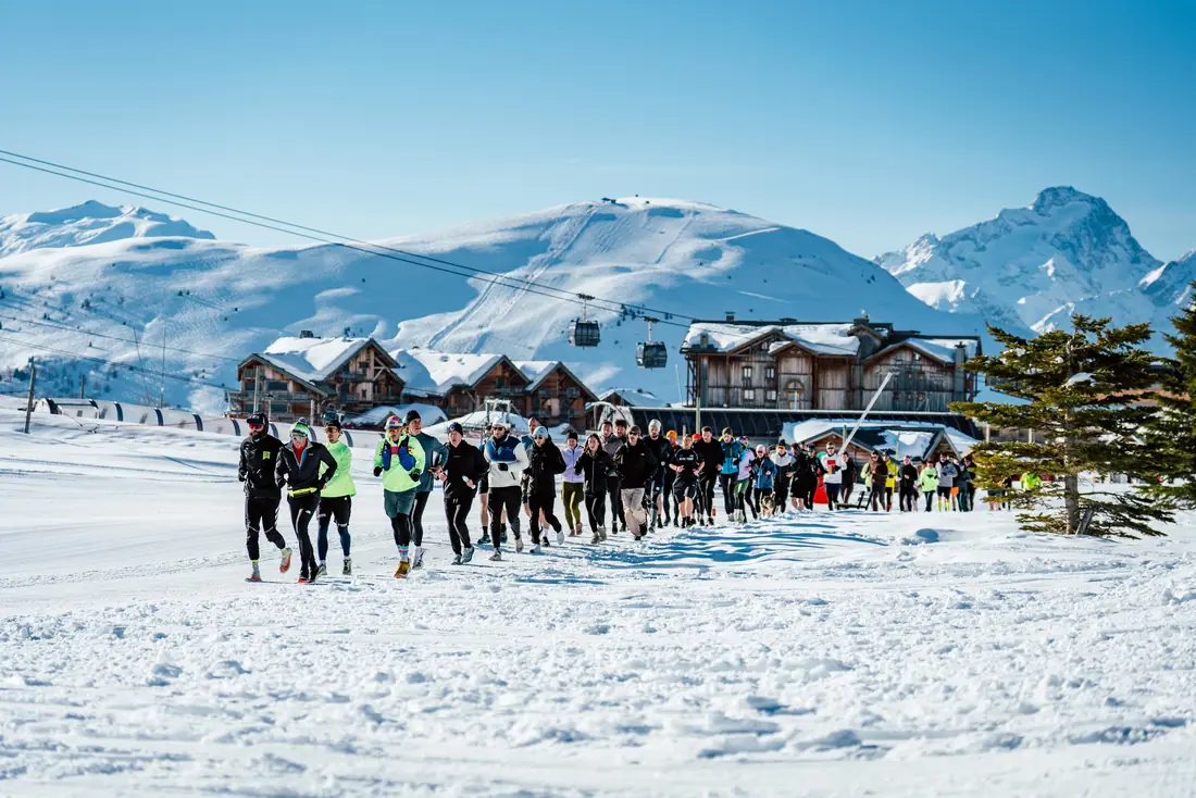 Grupo em aula de esqui em Alpe d'Huez